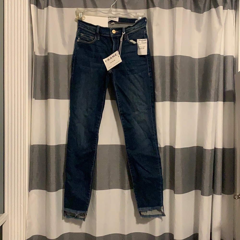 Frame size 23 mid rise skinny jeans.